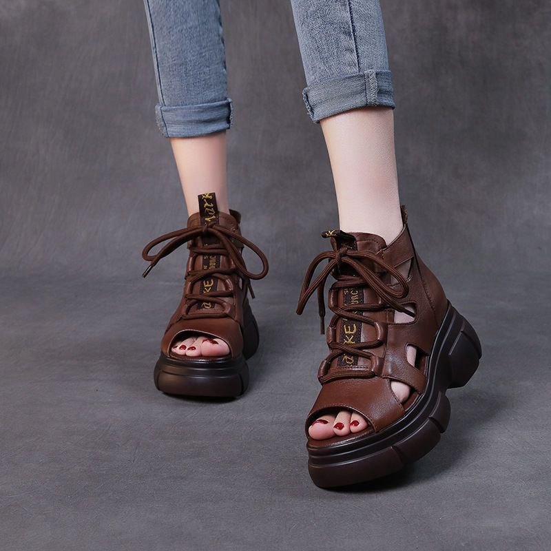 Sandalias de cuero suave retro hueco de soleas gruesas de verano 2024 muffin fondo de tacones de pez boca de lazos sandalias de soleas planas mujeres
