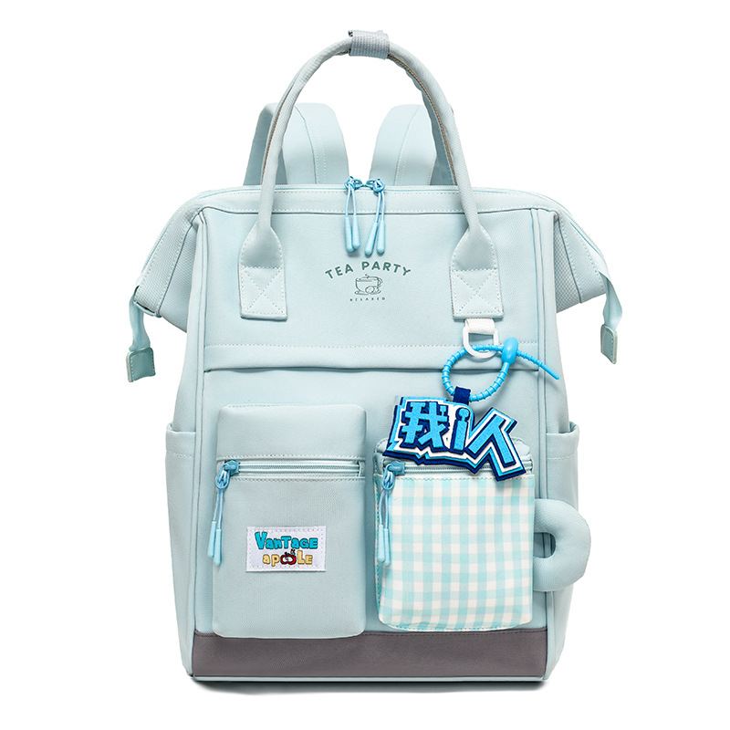 Bolsa de maternidad estilo japonés, de gran capacidad y alta estética, mochila para estudiantes, bolsa de maternidad portátil para exteriores, mochila de doble asa al por mayor.