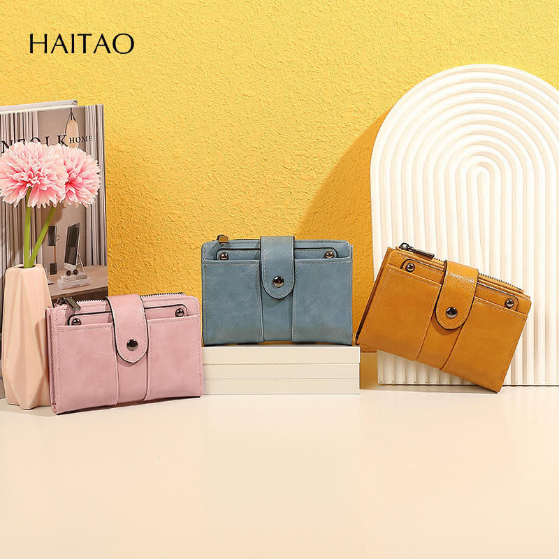 2025 nueva billetera retro de alta gama monedero de cuero dos veces corto con múltiples tarjetas, billetera de mujer