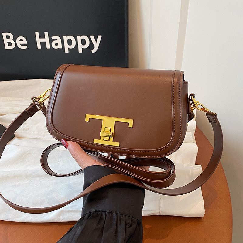 A principios de otoño 2025 nuevo bolso de mujer nicho bolso de diseño original bolso de brazo de moda moda moda bolsa de silla versátil bolso de tramo inclinado