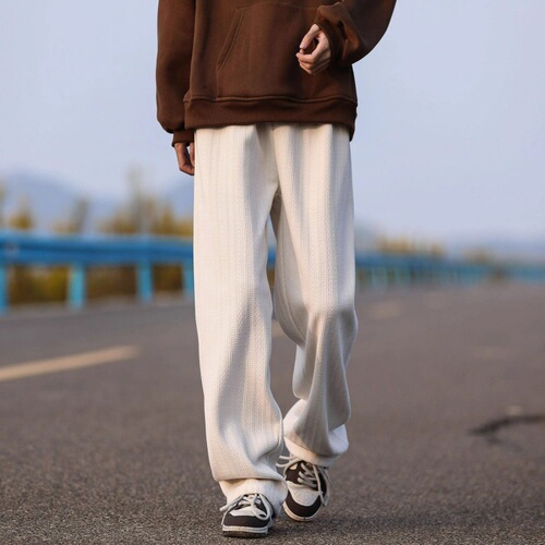 Designer-embossed casual pants for men, suitable for spring and autumn, American high street style, loose and flowing, versatile youth sports pants