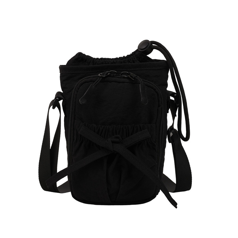 Bolso de teléfono móvil de moda coreana 2025 verano nuevo bolso femenino lindo lazo bolso de hombro bolso de mensajero de lona casual