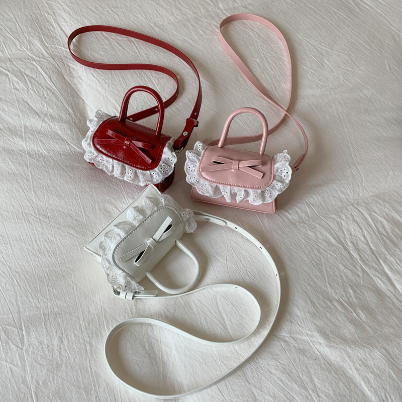 Mini bolso para mujeres nuevo lindo arco PU inclinado a través de bolsos pequeños bolsos de lápiz labial para niñas accesorios bolsos de moda para niños