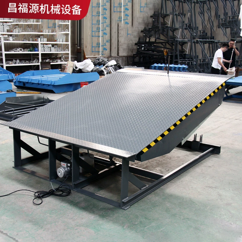 Индивидуальная платформа для погрузки и разгрузки контейнеров с электрическим гидравлическим подъемником, регулируемая пластина для складских логистических операций.