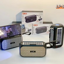 LP-V107跨境新款双太阳能手提户外蓝牙音箱便携手电筒迷你收音机