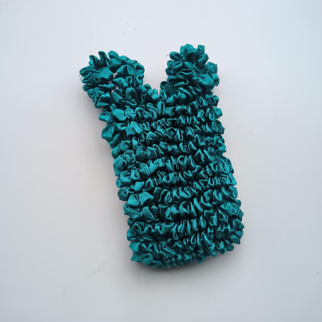 Bolso de burbuja multiusos popular de gran capacidad de la celebridad de Internet de las mujeres Bolso de burbuja japonés y coreano nuevo bolso mágico bolso telescópico bolso plisado