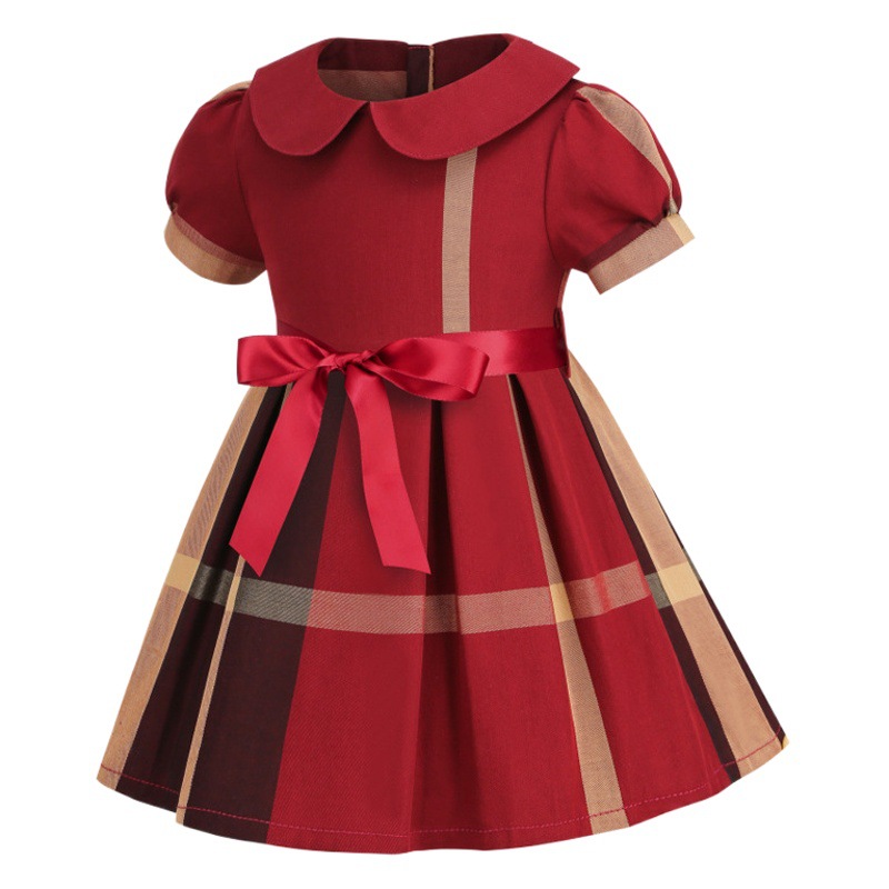 Ropa infantil de comercio exterior, verano 2025, nuevo estilo, vestido de niña de algodón a cuadros con lazo en la solapa y mangas cortas, suministro exclusivo transfronterizo.