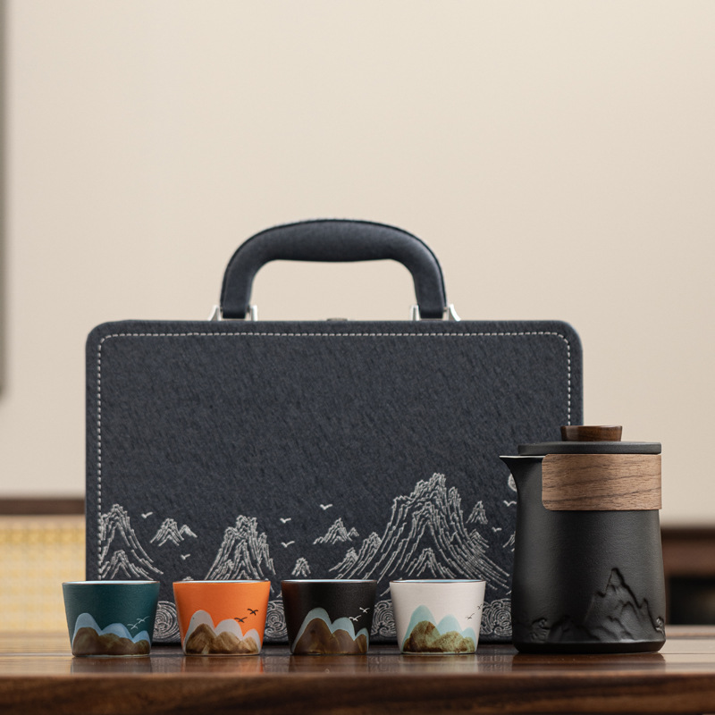 Conjunto de té de viaje de cerámica de estilo chino regalos de negocios de talla de taza de marca regalo de mano de empresa estatal bienestar