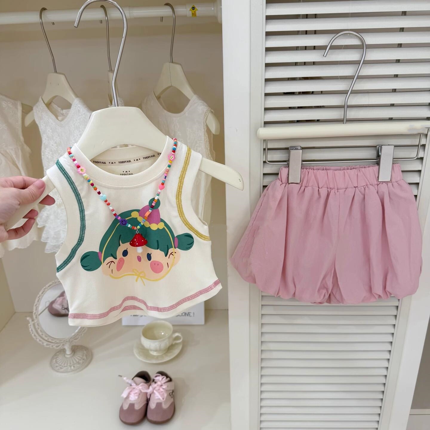 Xianning siete ropa para niños verano niñas chaleco de algodón 2025 nuevo verano niños dulce y fresco dibujos animados camiseta sin mangas marea