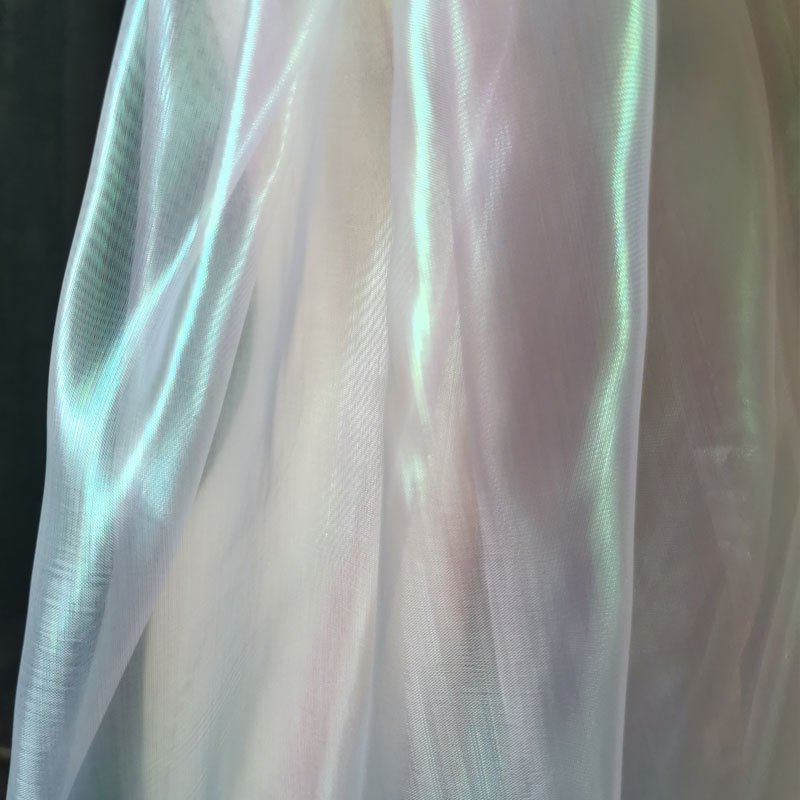 镭射幻彩欧根纱 七彩礼服婚庆网纱渐变透视布料设计师面料