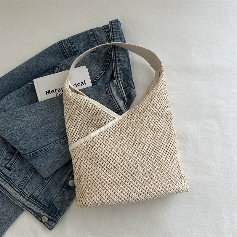Bolsos de gran capacidad simples para mujeres 2024 nueva moda versátil bolsas de hombro casuales tejidas bolsas de playa para mujeres
