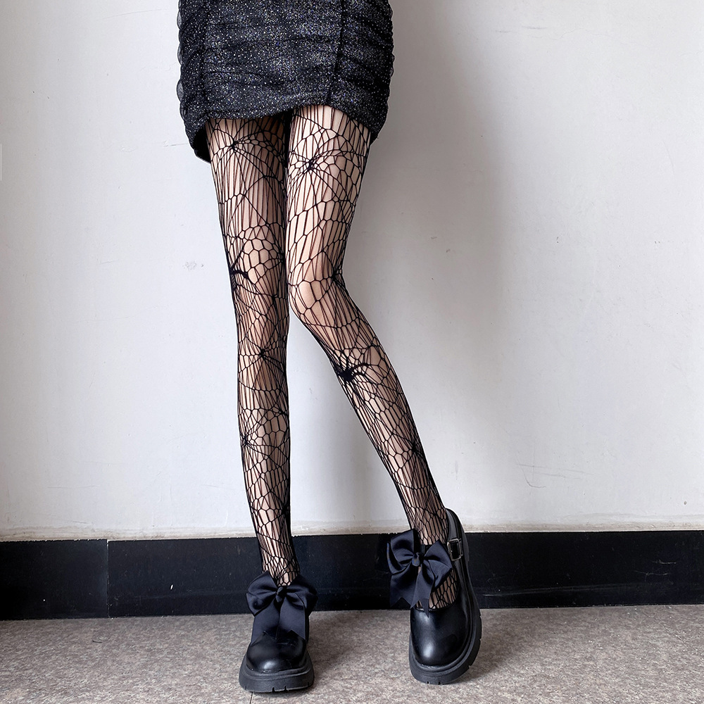 Medias sexys estilo europeo y americano Benqian, pijamas nuevos transfronterizos, lencería sexy para parejas de Halloween, medias de rejilla huecas y lindas serie WK