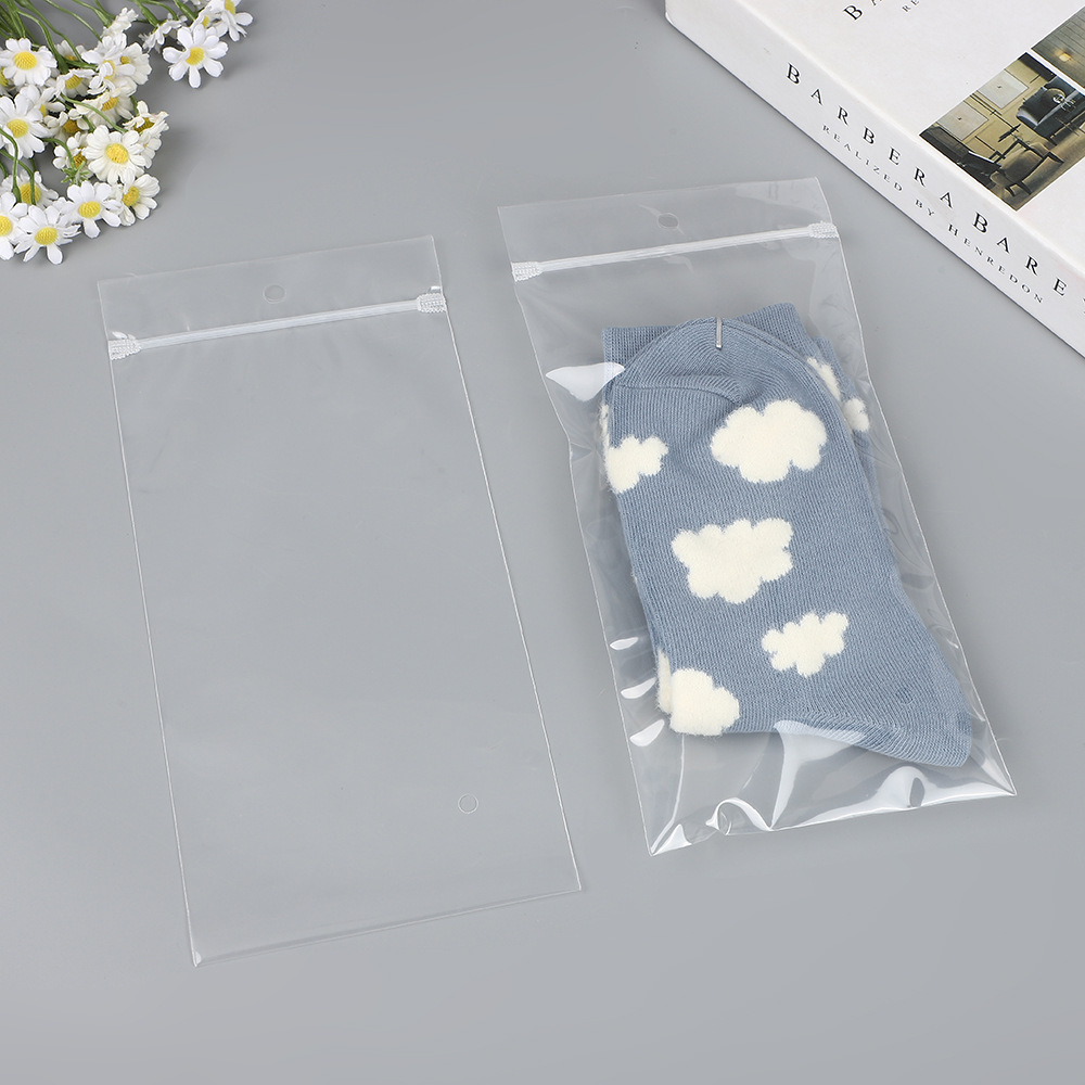 Fabricante spot pe transparente tira de hueso con cremallera calcetines mangas de hielo bufanda de seda bolsa ziplock en blanco con LOGOTIPO