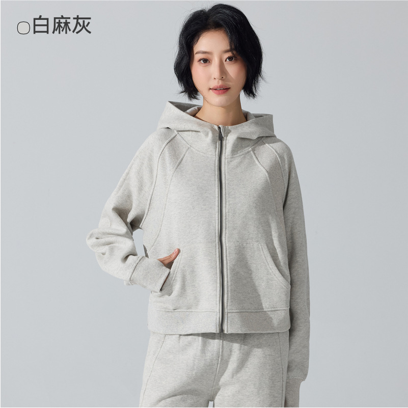 Otoño y invierno de moda con cremallera camiseta encapuchada calentadora y camiseta deportiva casual universal cardigan chaqueta de yoga superior mujer