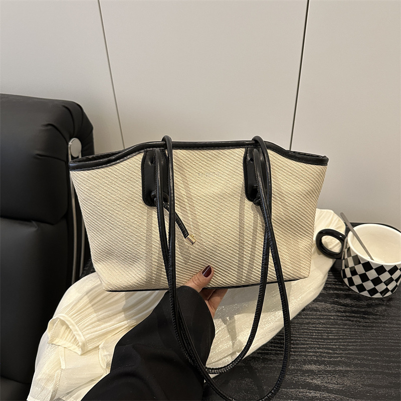 Bolso de viaje portátil primavera / verano para mujeres 2025 nuevo bolso de moda, bolso de hombro de gran capacidad, bolso de mujer de alta calidad