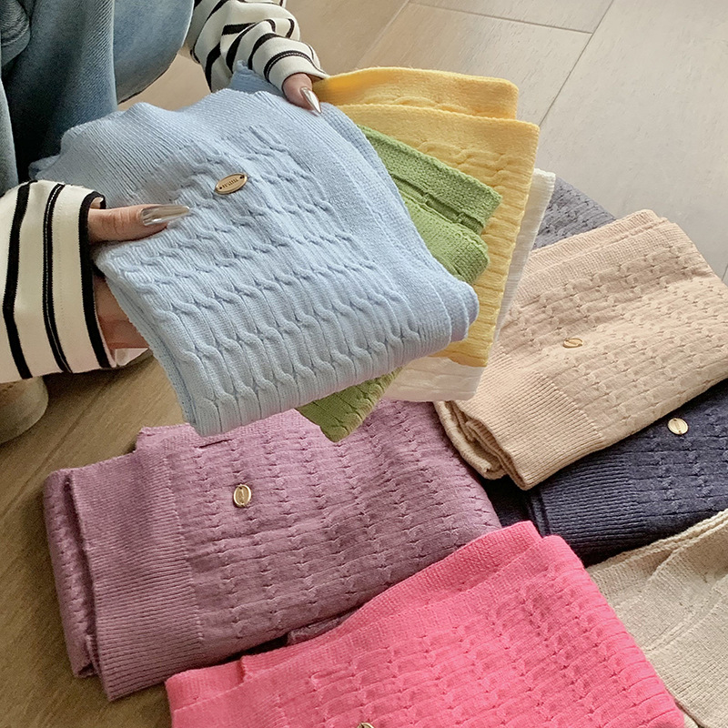 Sopa de punto de alta sensación de color sólido primavera y verano nuevo tipo de aire acondicionado cuello de protección texturizado sopa de pequeño hombro