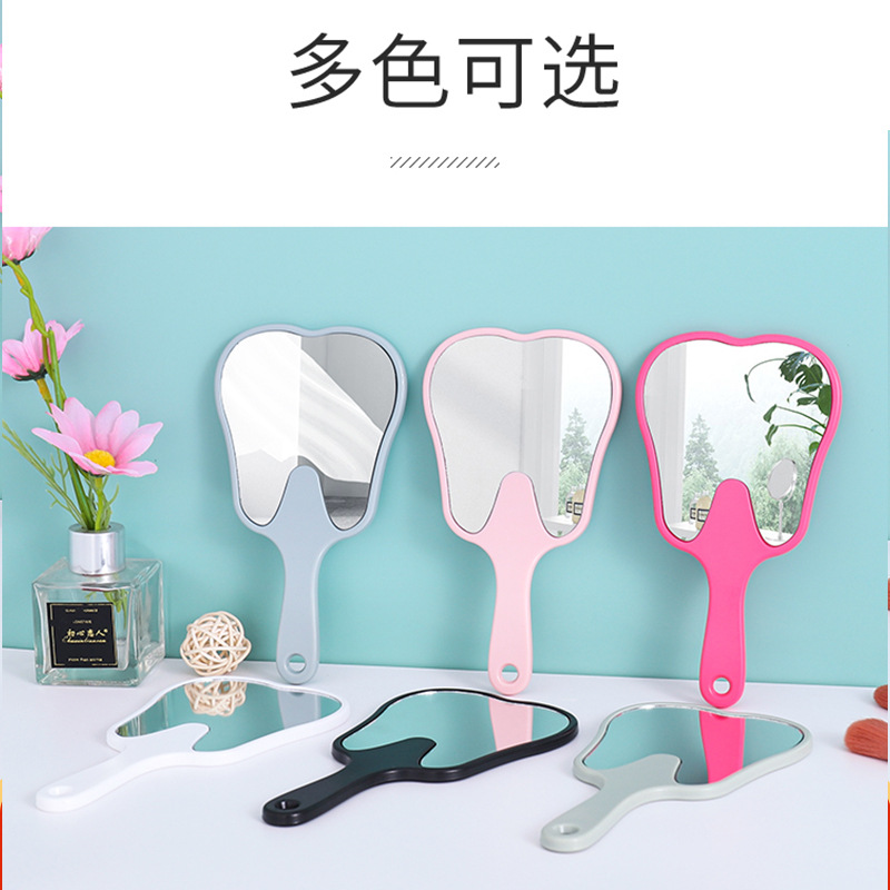 Espejo portátil en forma de diente pequeño clínico dental HD espejo de mano multicolor publicitario
