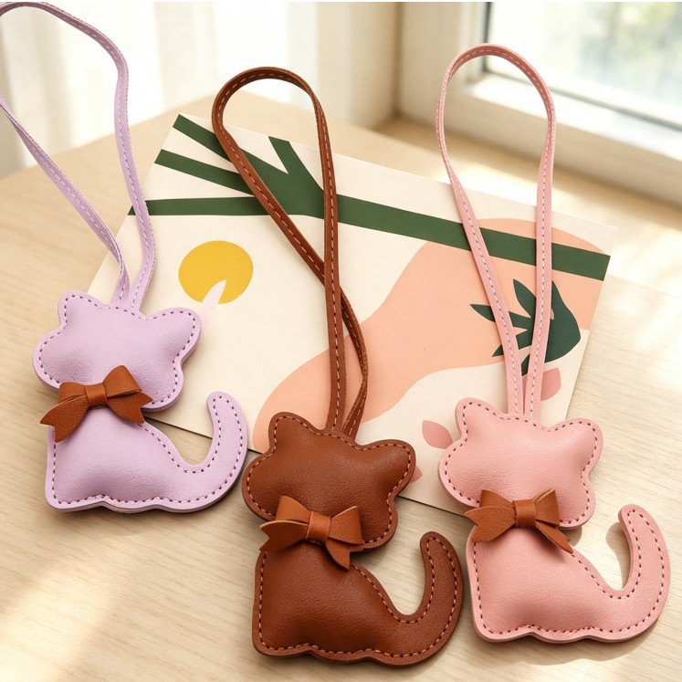Creative PU leather cat bag pendants, various high-end cartoon cotton-filled fashion bag accessories suitable for both men and women