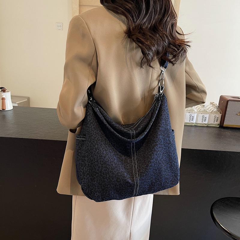 Bolso de hombro para mujer de gran capacidad de viaje casual 2024 nueva lona de moda con estampado de leopardo bolso de mensajero al por mayor