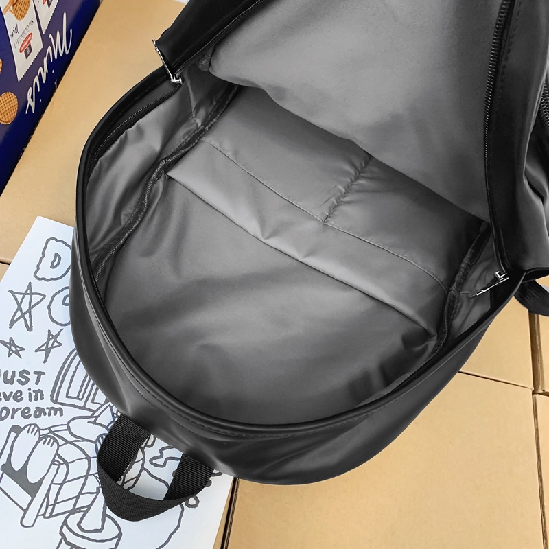 Comercio exterior nuevo estilo cuero suave gran capacidad color sólido escuela de secundaria mochila de moda masculina todo fósforo mochila simple japonesa