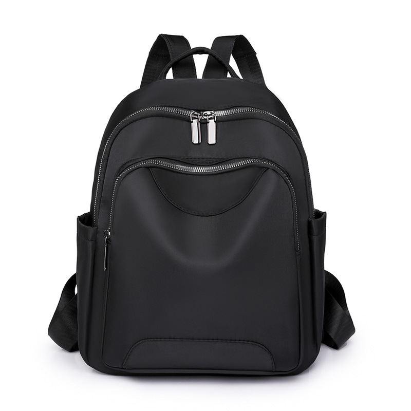 Fábrica al por mayor 2023 nueva mochila de nailon para mujer coreana simple mochila de viaje urbano mochila escolar de moda