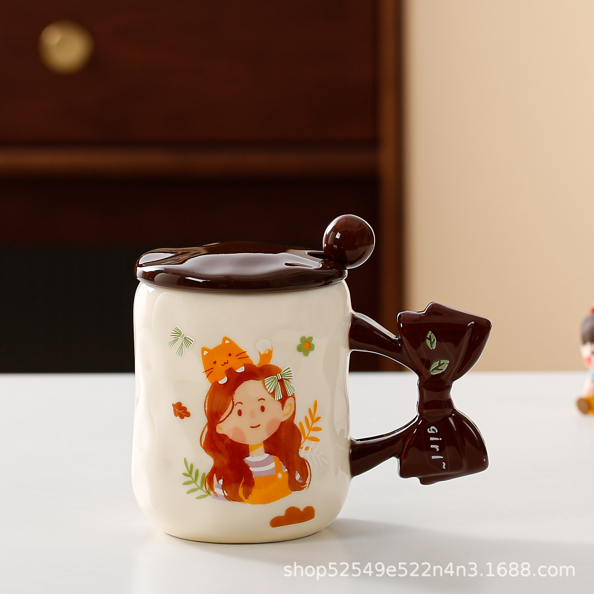 Arco de dibujos animados transfronterizos mango taza de cerámica taza de agua de alto valor taza de regalo con taza de café cuchara cubierta