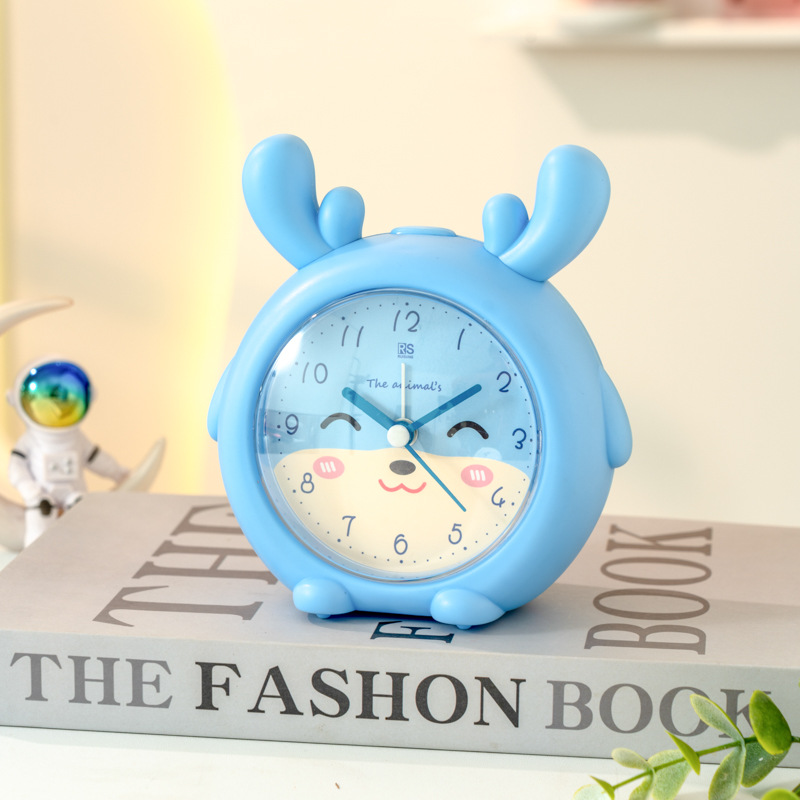 Fábrica directa de cuerno de ciervo despertador de dibujos animados color caramelo silencioso con lámpara despertador para estudiantes WenChuang pequeño despertador especial