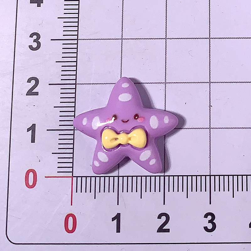 Cartoon brillante corbata estrella de mar material DIY accesorios de resina pegamento crema caja de teléfono móvil material clip de pelo parche de taza de agua