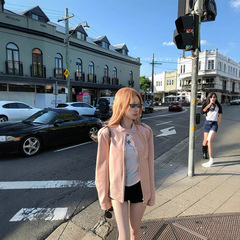 Cool line林子熙ロンドンの昔の店主はピンクのシンプルな革のコートを愛していました。