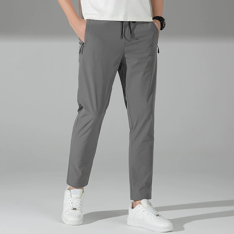 Летние повседневные брюки из ледяного шелка, тонкие брюки до щиколотки, быстросохнущие корейские мужские свободные брюки для молодых студентов, эластичные Четырехсторонние брюки
