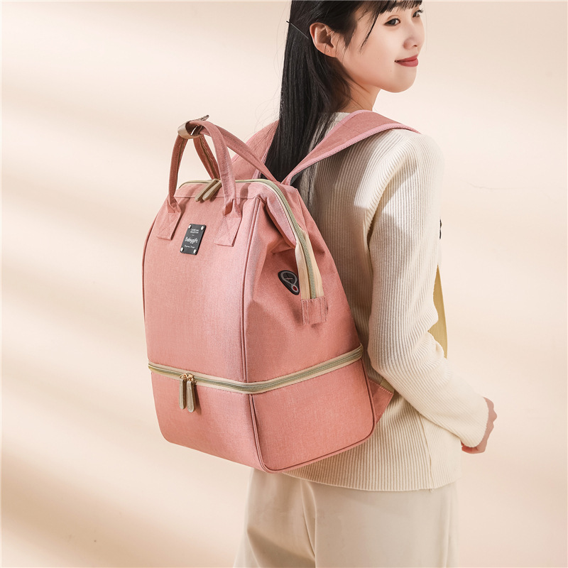 Bolsa tipo momia de gran capacidadSeparación doble zona húmeda/secaMochila multifuncional para transporte de leche materna