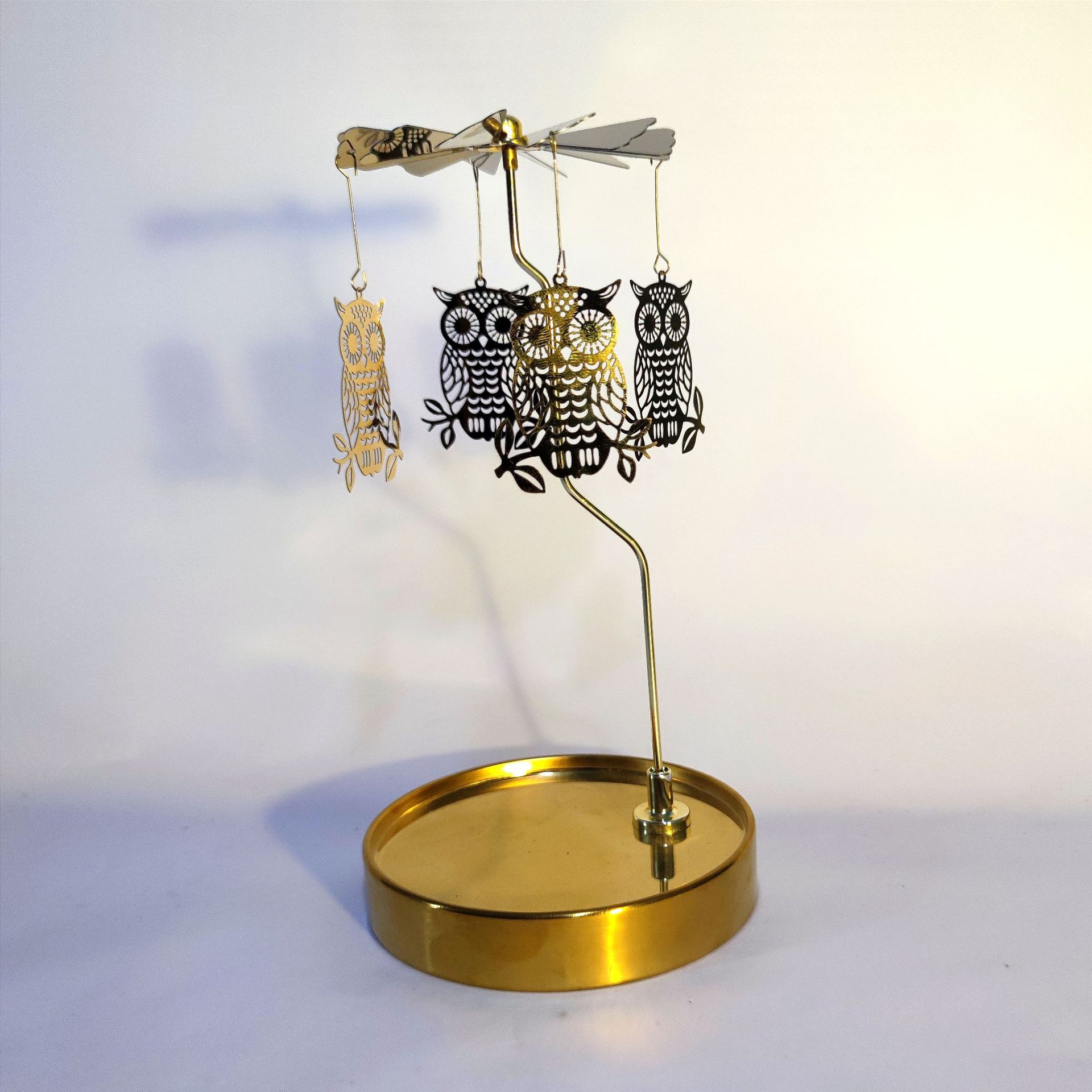 Fuente fabricante al por mayor Amazon INS bandeja redonda de acero inoxidable linterna giratoria giratoria candelabro de aromaterapia giratoria