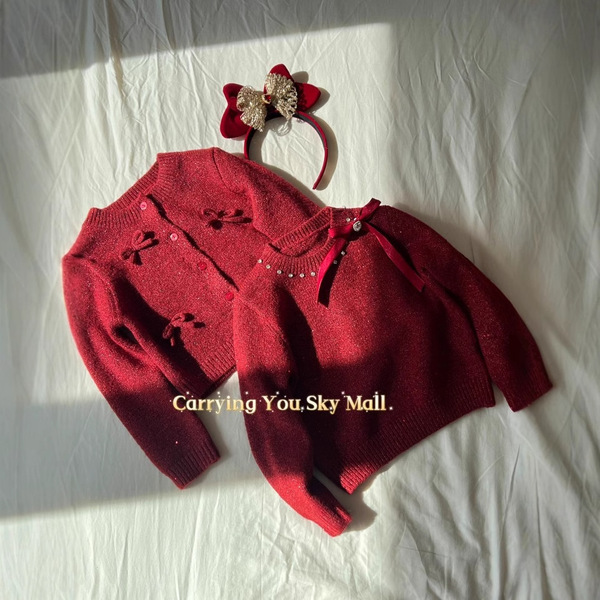 Demi-season children's red knitted sweater with bow with a round…