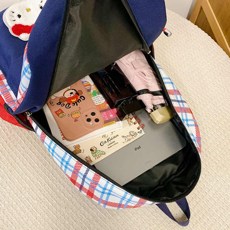 アメリカのレトロな格子のリュックサックの女子大学生の大衆のかわいい漫画の猫のリュックサックの大容量の軽いかばん|undefined