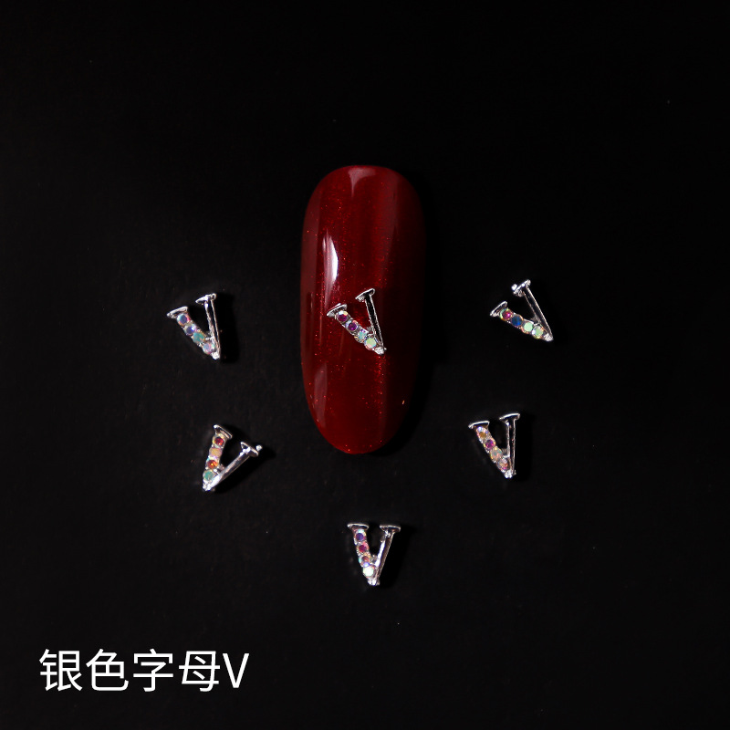 Nueva LZ manicura 26 letras aleación joyería estilo japonés Internet celebridad plata letras manicura joyería clavo Taladro