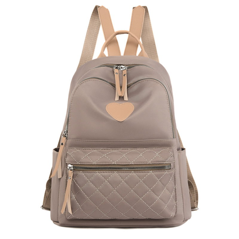 Venta al por mayor transfronteriza 2023 primavera nueva mochila Oxford casual para mujer simple y versátil mochila ligera al aire libre marea