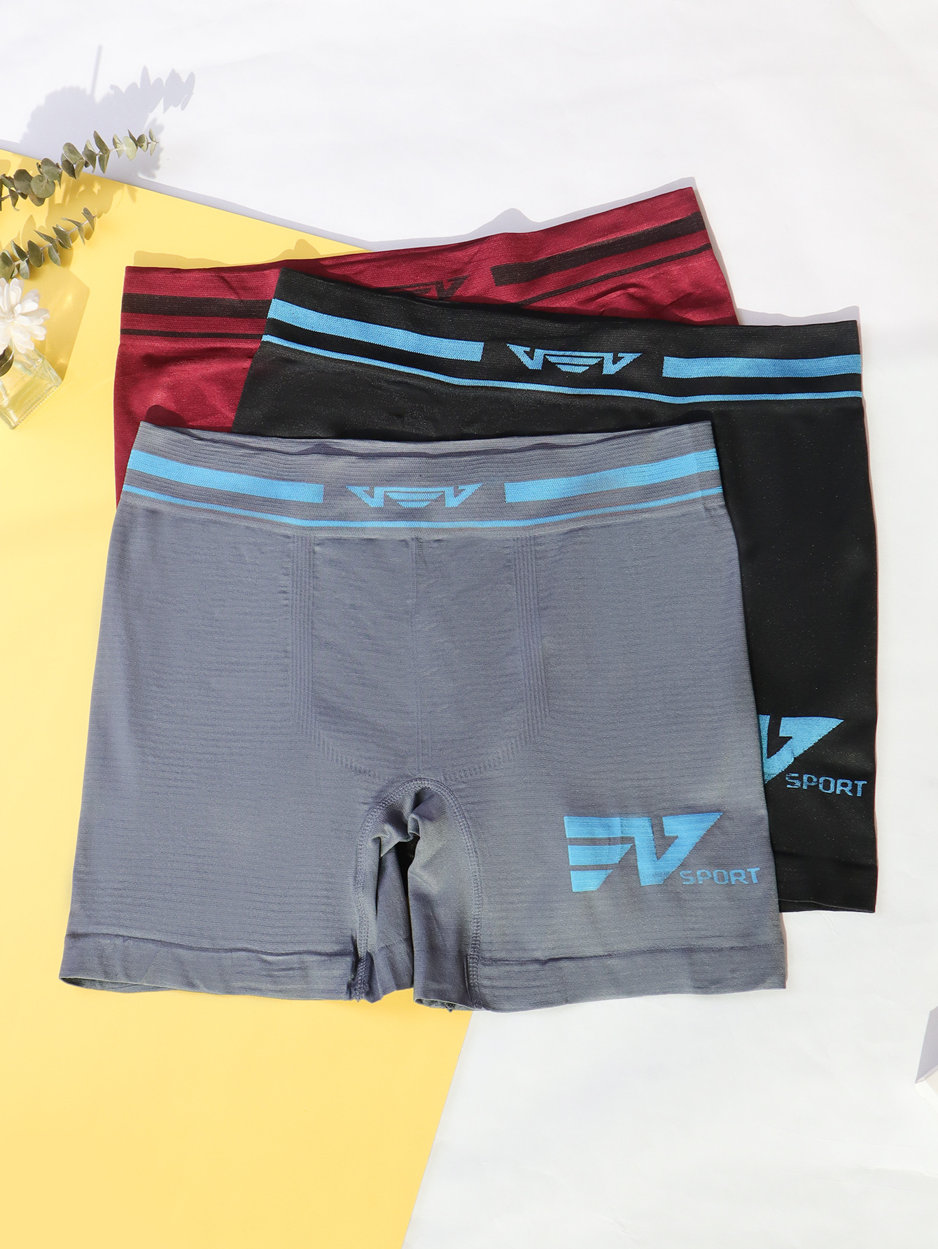 Calzoncillos bóxer deportivos para hombre, de cintura media, sin costuras, de poliéster elástico, transpirable, con sensación de desnudez, de color sólido, de pierna larga.