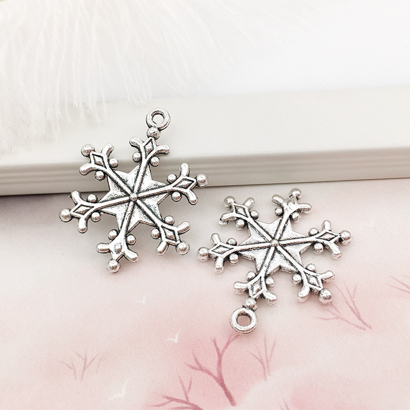 1 copo de nieve aleación colgante DIY aleación joyería brillante plata hueco copo de nieve colgante transfronterizo Amazon Venta caliente