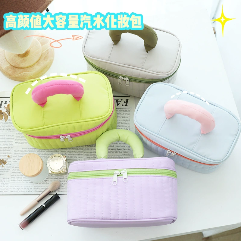 Brand cosmetic bag, small capacious handheld storage system, 2022