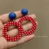 13 blue ear clips