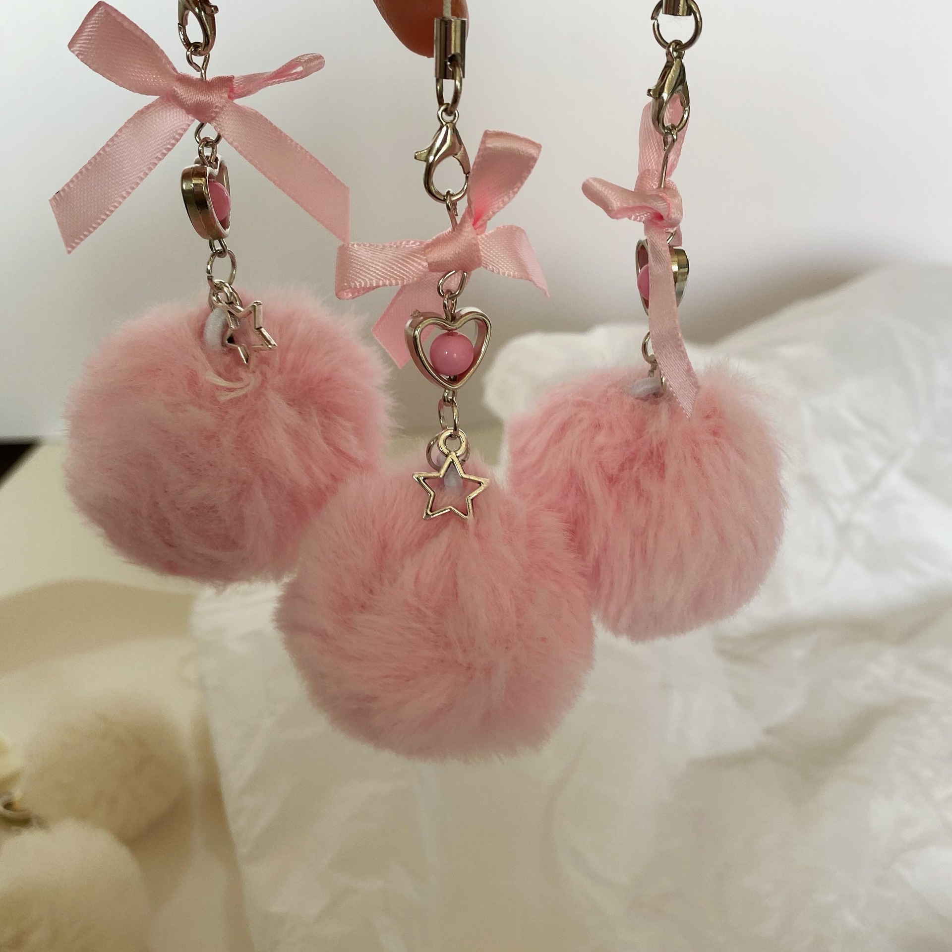 Cute Bow Knot Seto Fur Pom Poms Mobile Phone Chain Keychain display picture 9