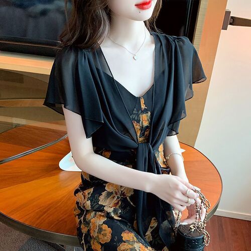 A light and breezy summer tank top dress with a small shoulder shawl, paired with an open front cardigan for added warmth and breathability, perfect for sunny days.