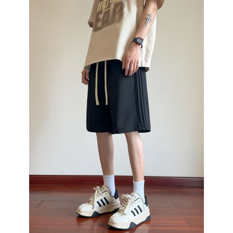 Pantalones cortos para hombres de verano delgados 2024 nuevos pantalones casuales de cinco puntos de moda pantalones deportivos de piernas largas sueltos para hombres