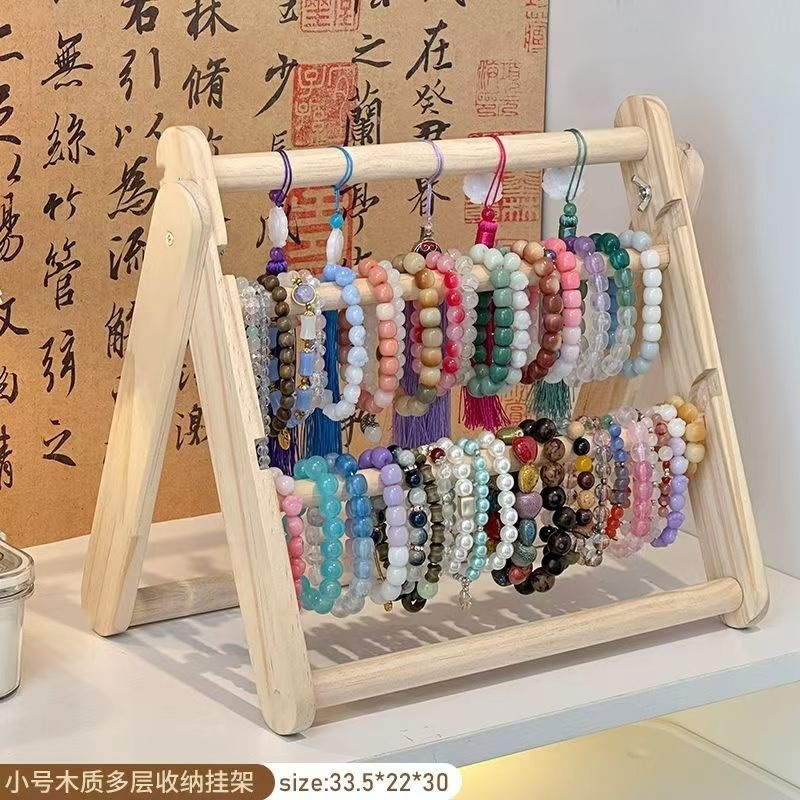 現品の実木のアクセサリーの棚のひもの頭の花の収納棚のカチューシャの髪のアクセサリーの陳列棚のブレスレットのブレスレットのハンガー|undefined