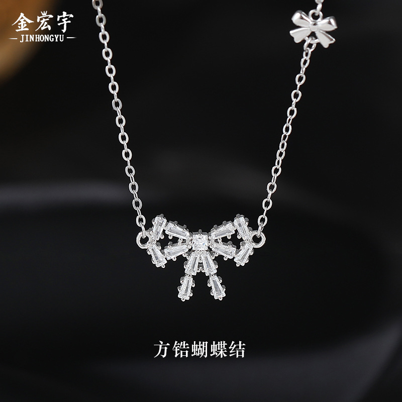Brand necklace with bow