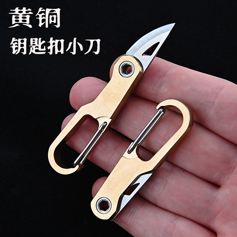 Brass keychain, sharp pocket knife, handheld box