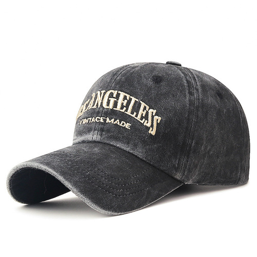 American-style washed baseball cap with an oversized, deep-curved design that flatters the face—vintage denim-inspired distressed look, featuring a trendy, extra-wide brim.