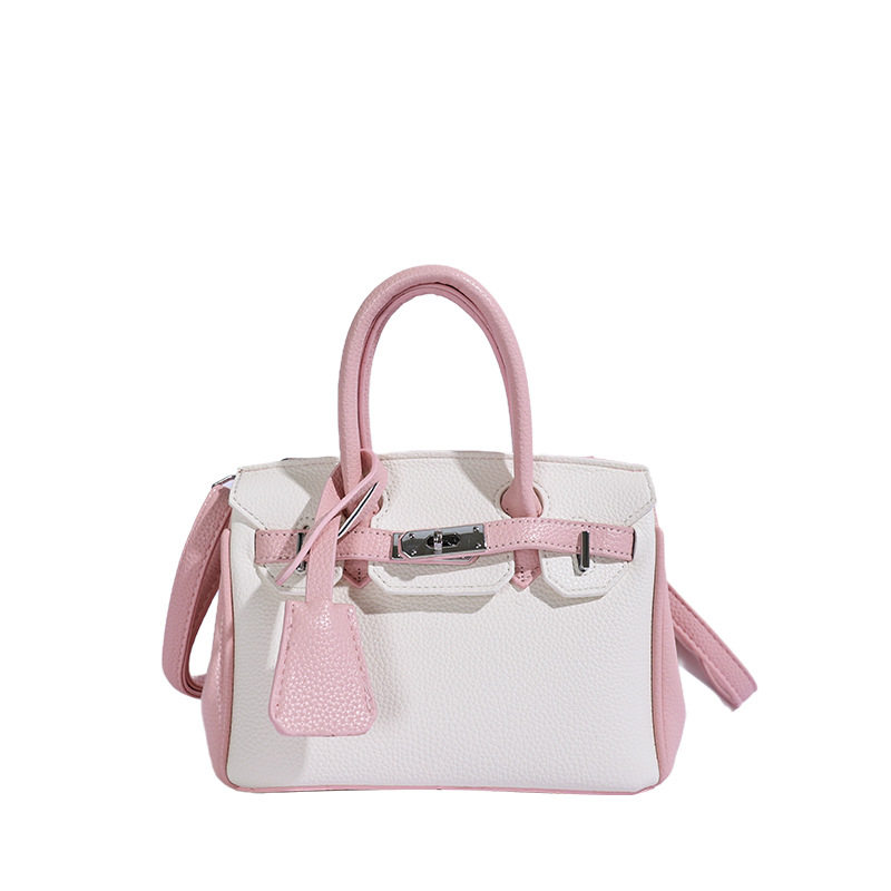 Bolso de platino portátil de litchi para mujeres 2026 comercio exterior nuevo estilo de alto nivel de sensación de tamaño de estilo de hombro mochila