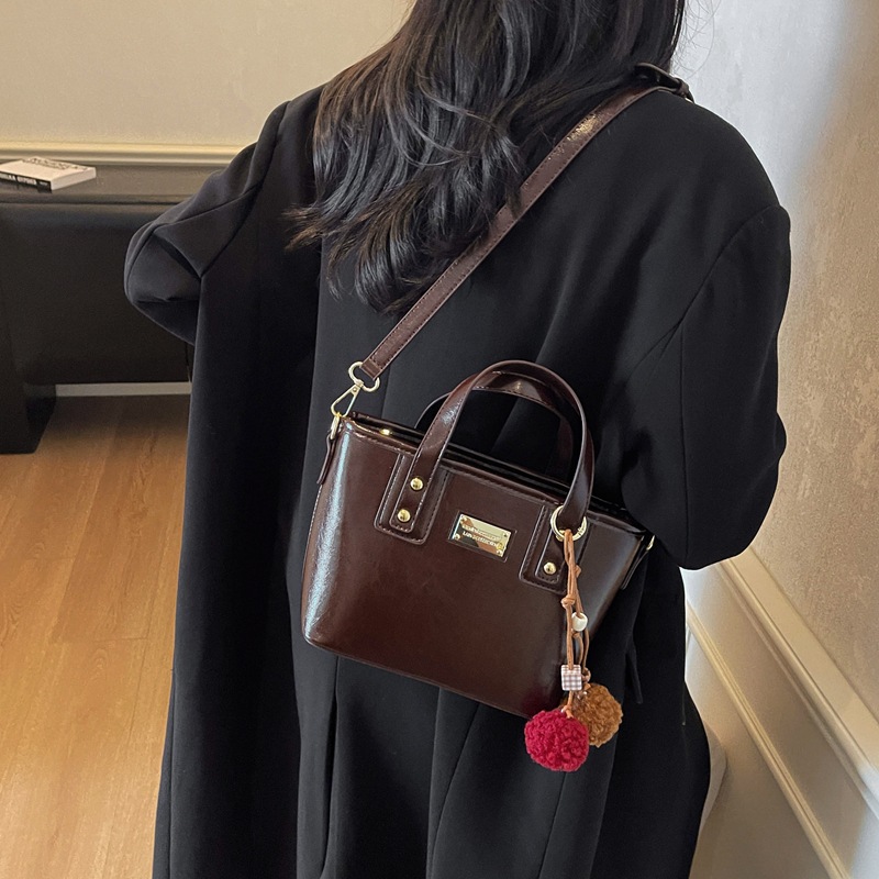 Bolso de moda de alta calidad retro bolso de cubo para mujeres otoño / invierno 2025 nuevo estilo versátil bolso de hombro bolso de mochila coreano