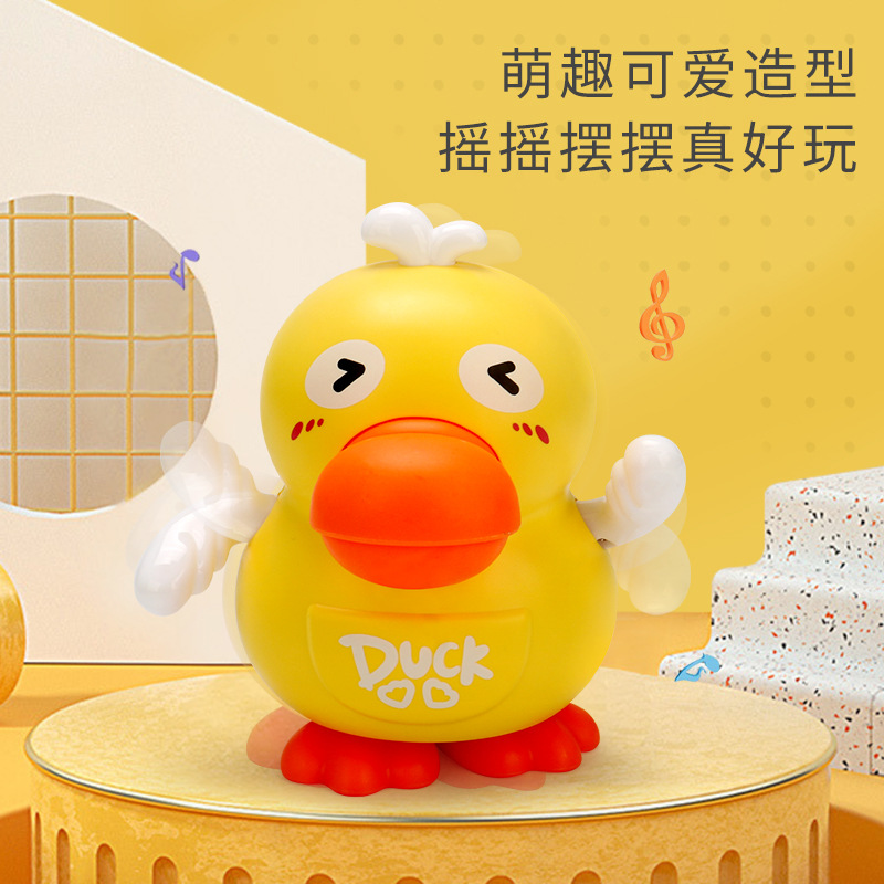 Tiktok mismo columpio eléctrico lindo pato música luz Linda muñeca eléctrica decoración creativa juguete al por mayor